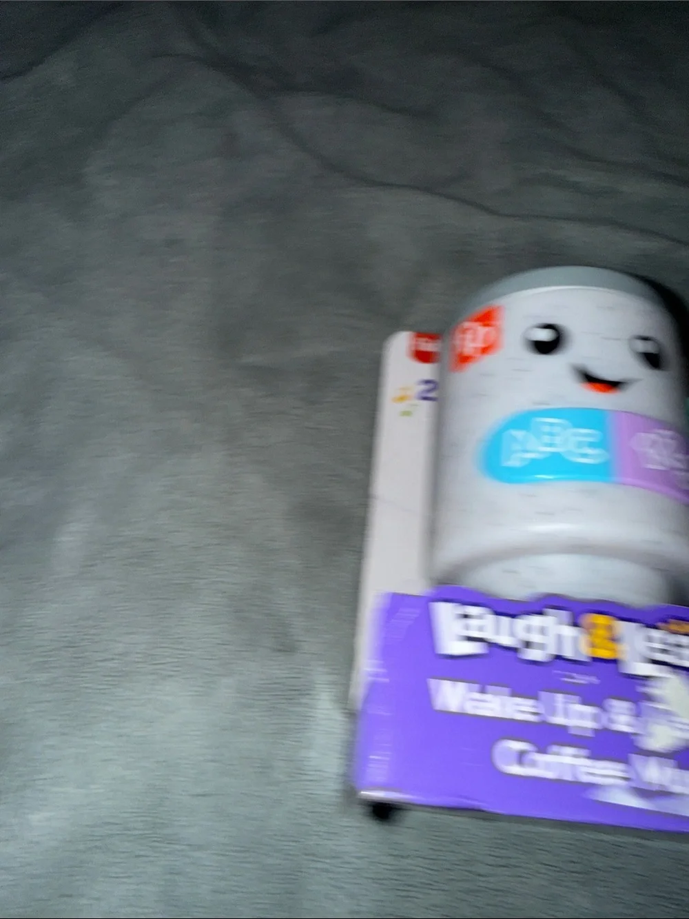 Fisher-Price Laugh & Learn Light-Up Learning Mug in Blue, Purple, Teal, Gray